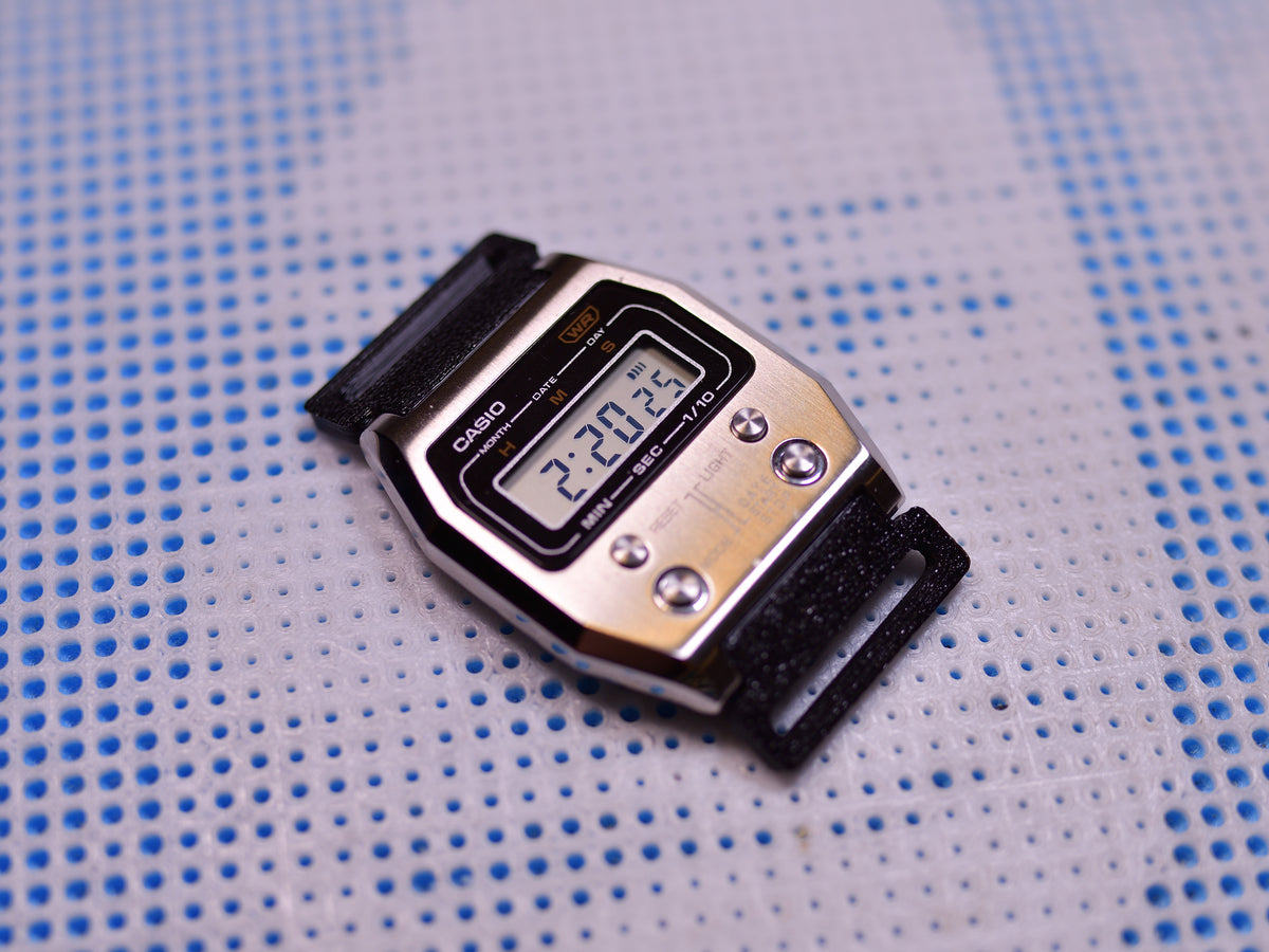 Casio AD1100D watch adapter, front view, adapters fitted