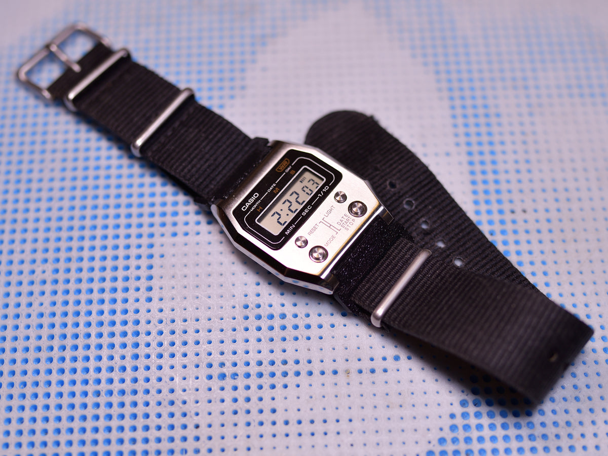 Casio AD1100D with black nylon strap fitted, angled view
